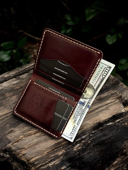 Safir Leather bordo renkli, el yapımı, mumlu dikişli, minimal tasarımlı hakiki dana derisi unisex cüzdan.
