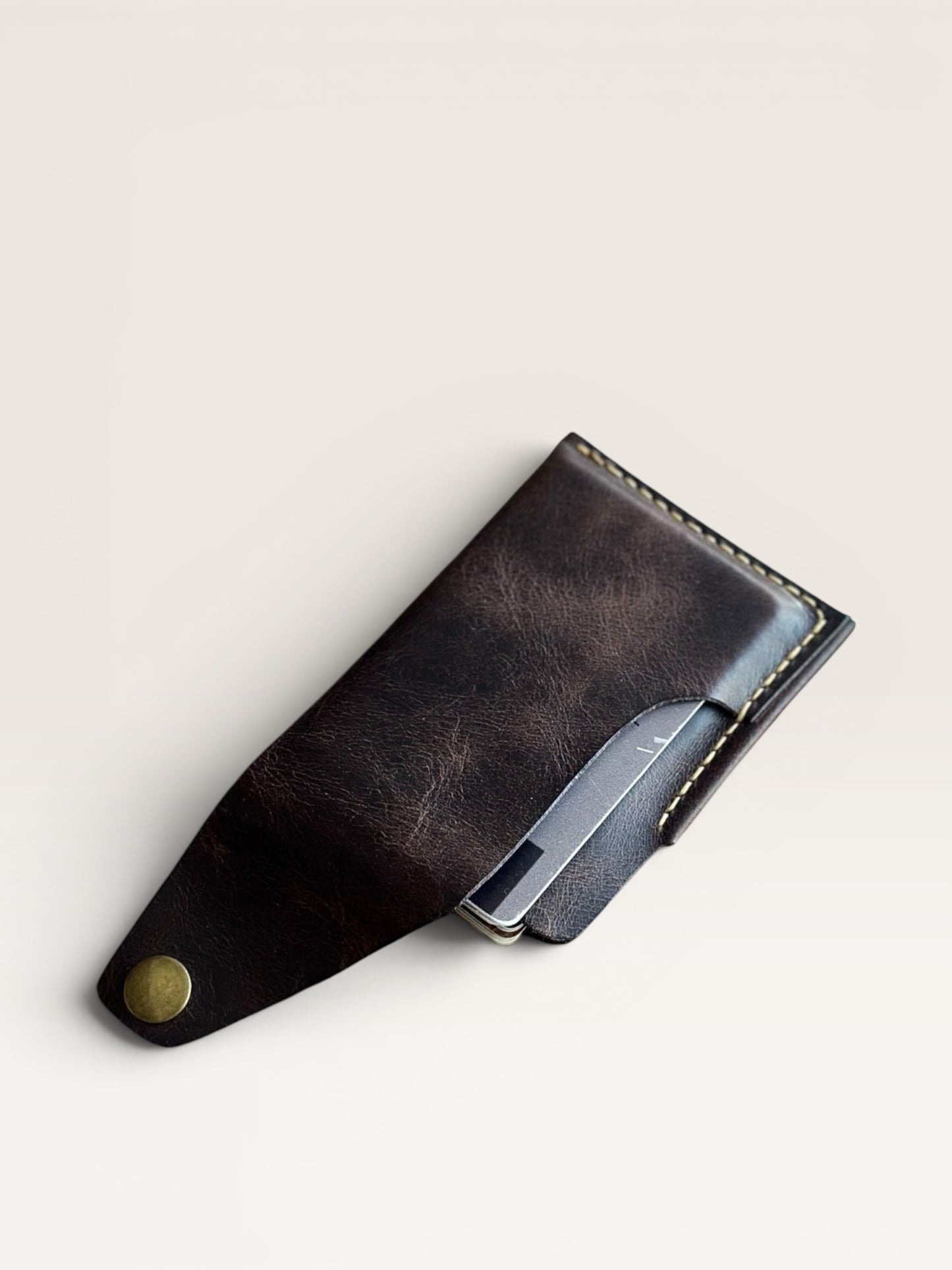 Safir Leather handmade dark brown genuine leather card holder, 8-10 card capacity, with snap closure.