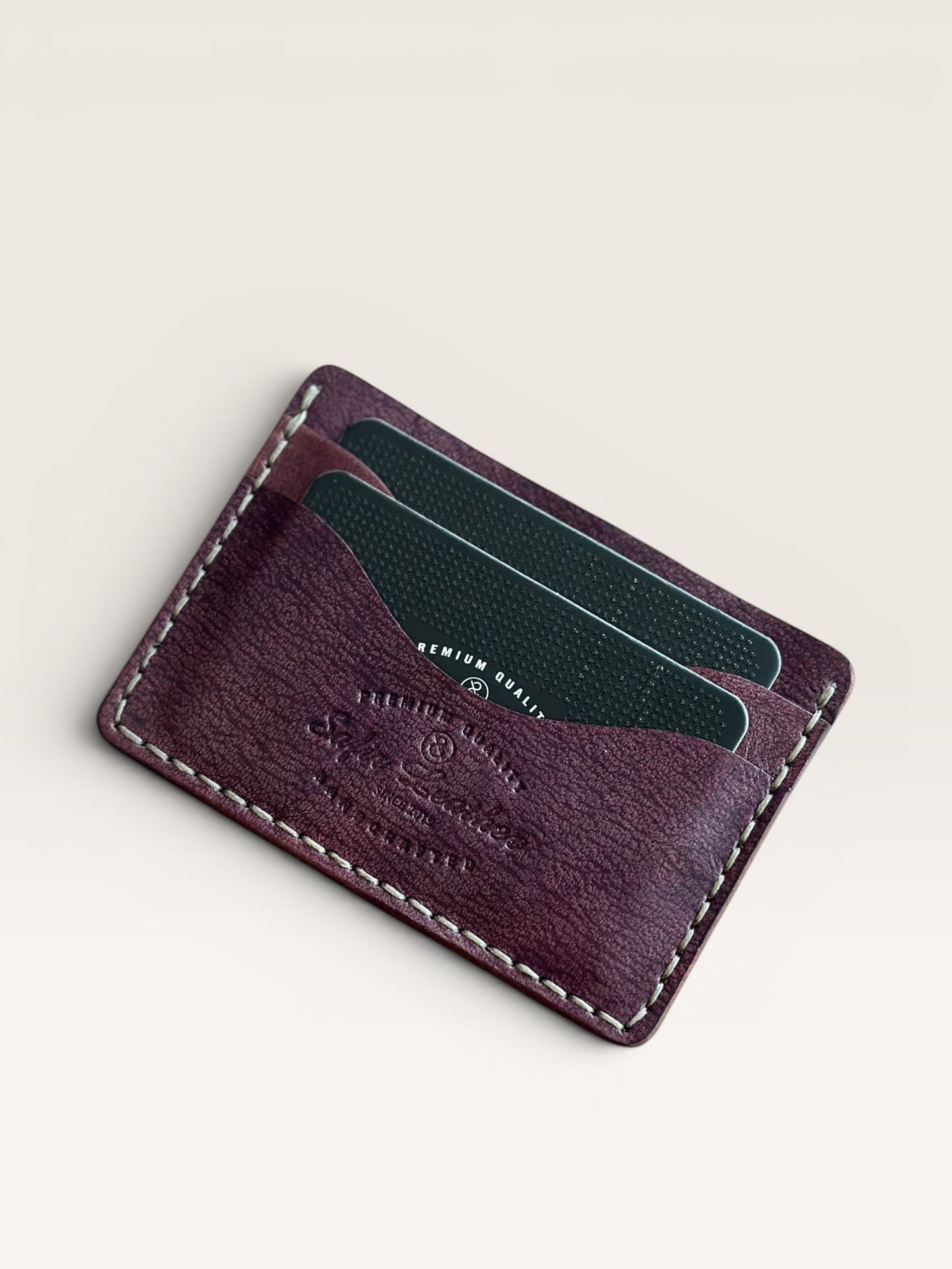 Safir Leather burgundy handmade Italian leather cardholder with 5 compartments and organic stitching.