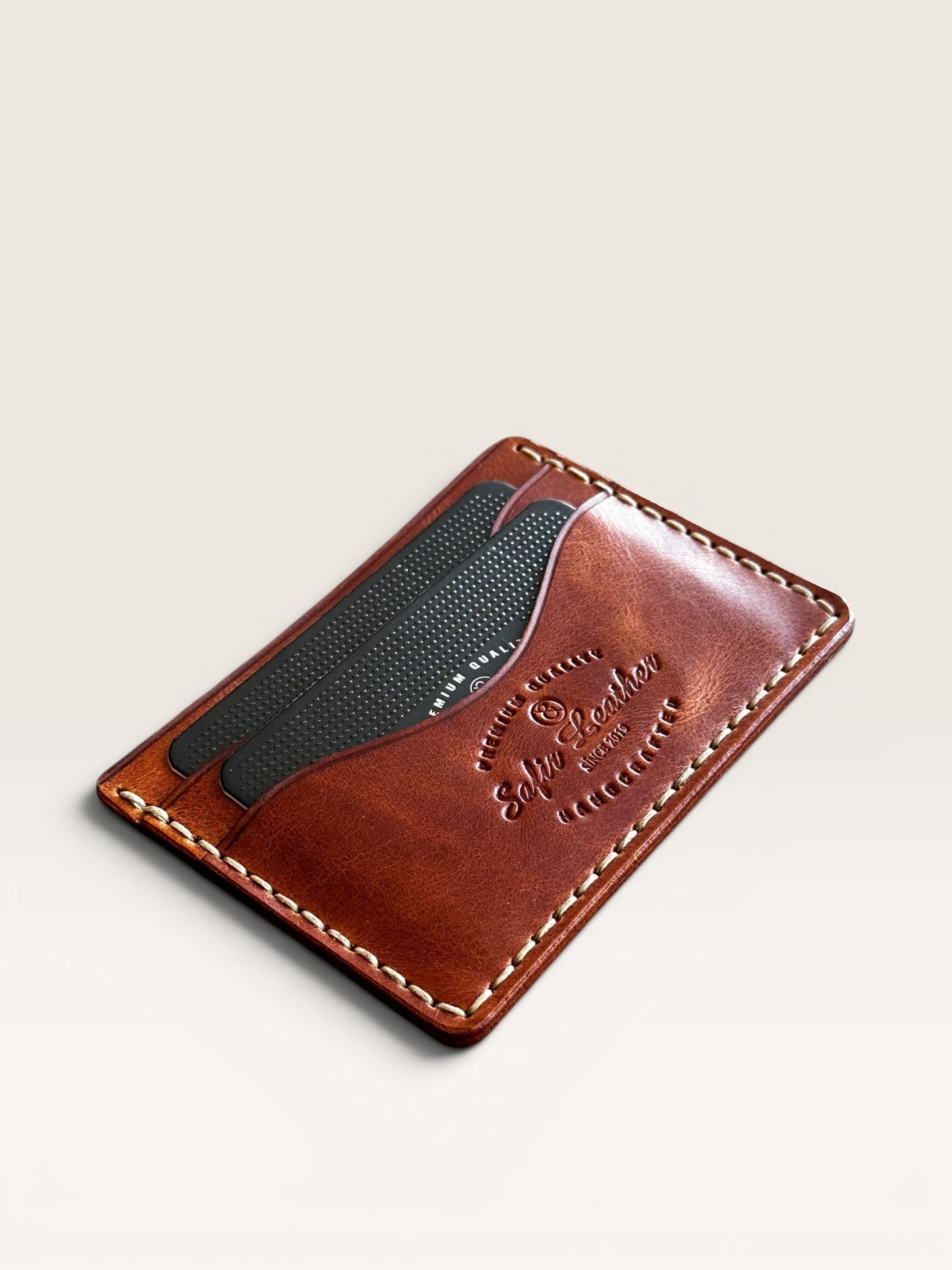 Safir Leather handmade brown Italian leather cardholder with 5 compartments and organic stitching.