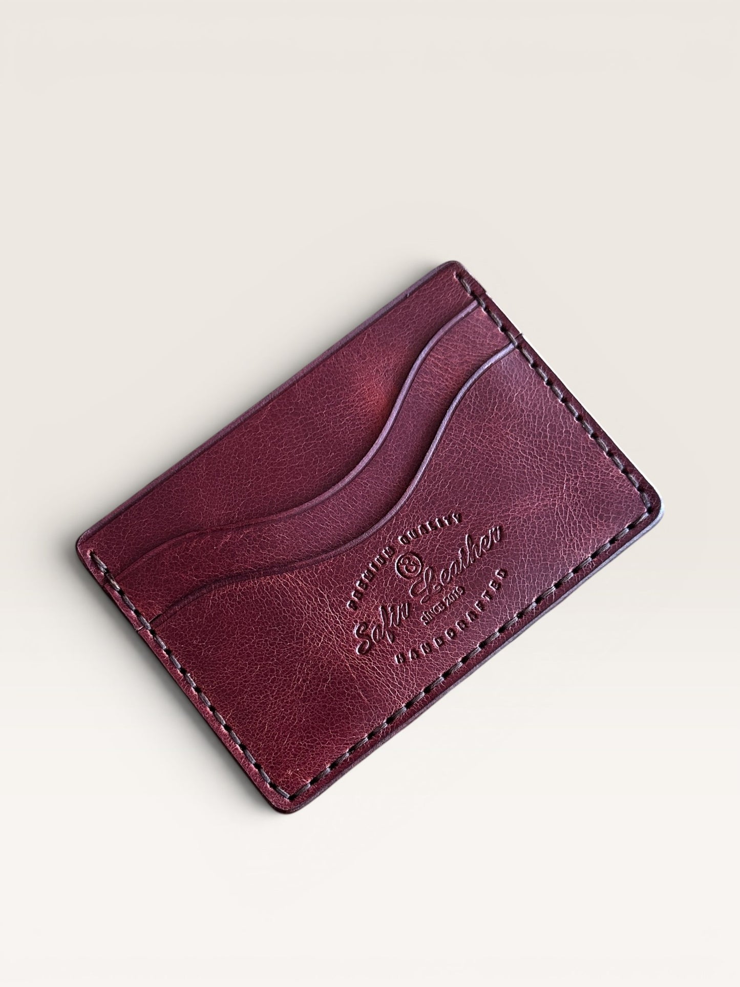 Safir Leather burgundy handmade Italian leather cardholder with 5 card slots and organic stitching.