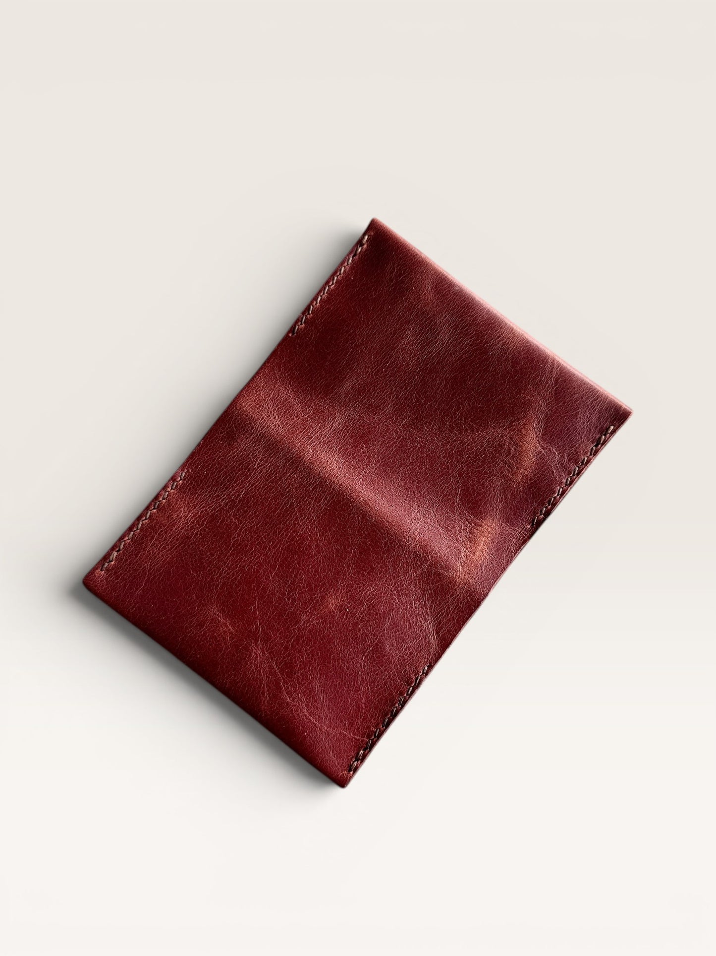 Safir Leather handmade burgundy genuine leather card holder with 4 compartments, minimalist vintage design.