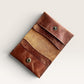 Safir Leather handmade caramel brown genuine leather card holder with 4 compartments and snap closure.