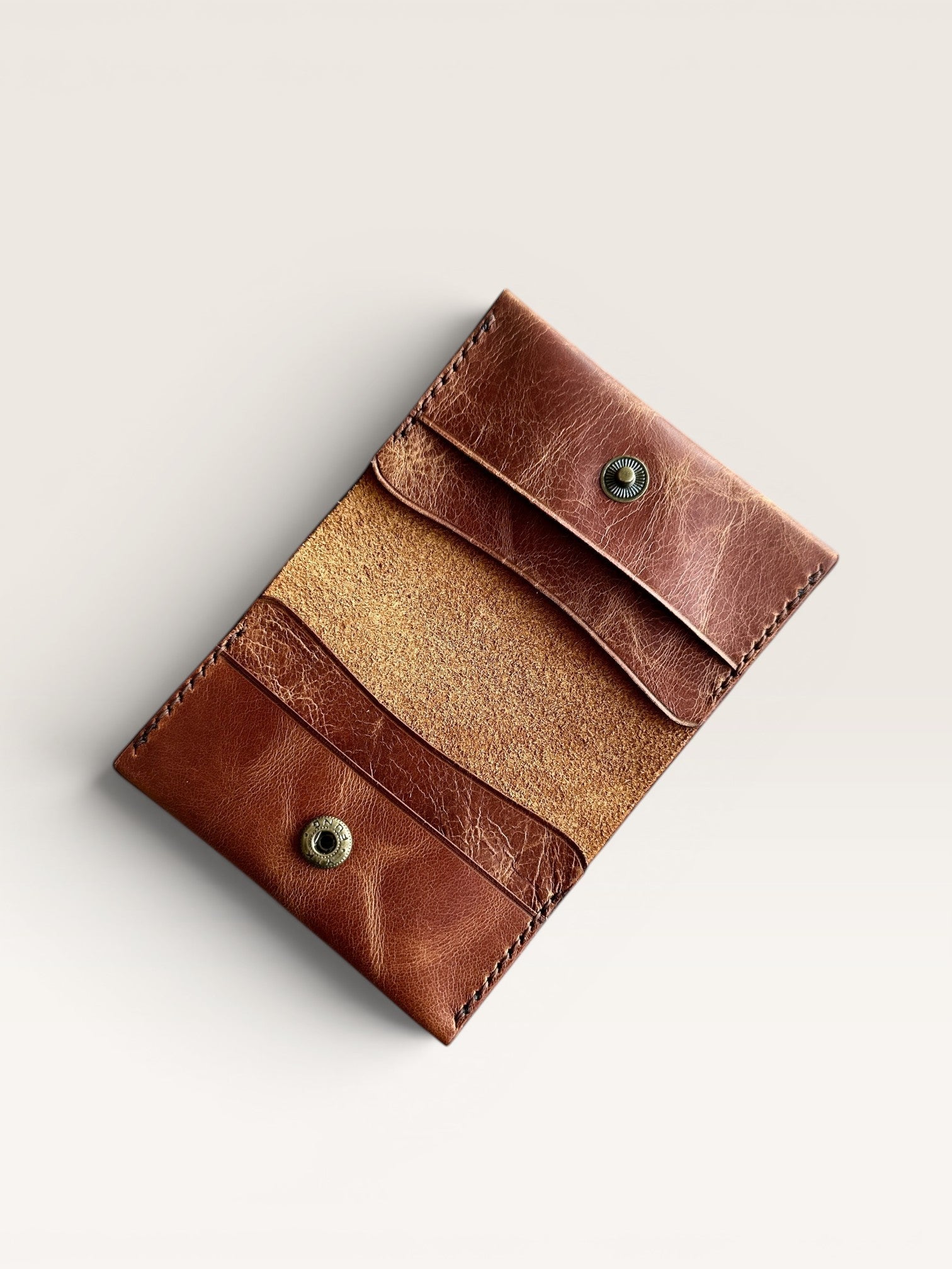 Safir Leather handmade caramel brown genuine leather card holder with 4 compartments and snap closure.