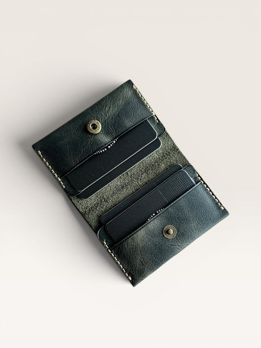 Safir Leather dark green handmade genuine leather card holder with 4 slots and brass snap closure. Minimalist design for men and women.
