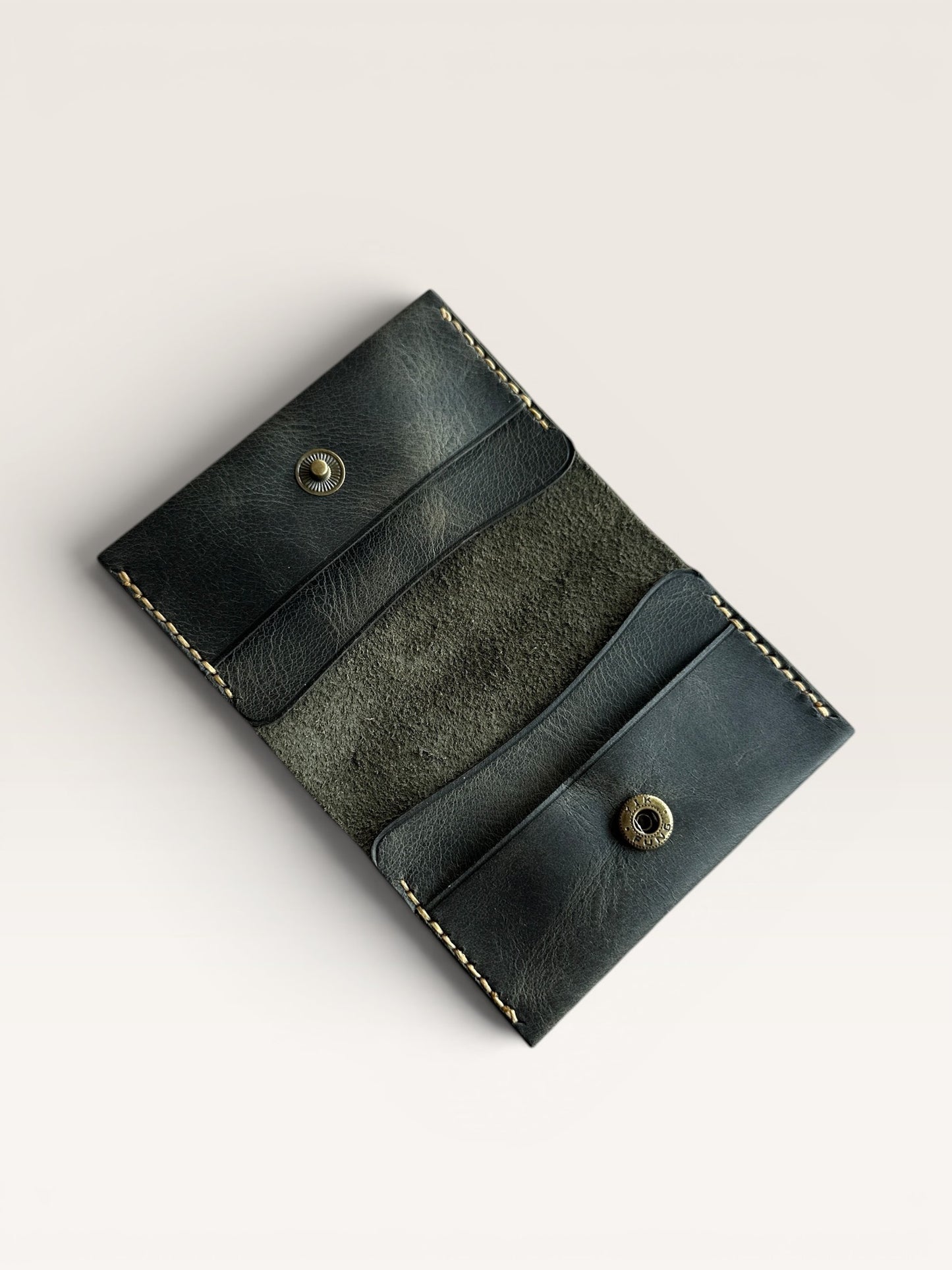Safir Leather dark green handmade genuine leather card holder with 4 compartments and snap closure.