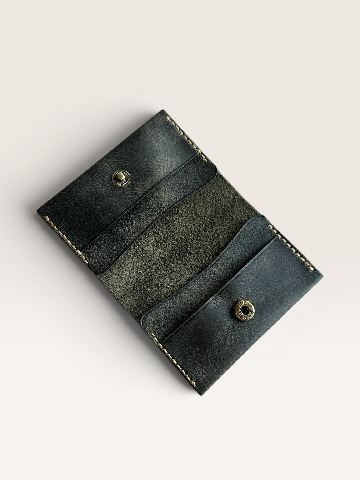 Safir Leather dark green handmade genuine leather card holder with 4 compartments and snap closure.