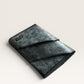 Safir Leather dark grey premium leather cardholder with 4 card slots and unique stitching detail.