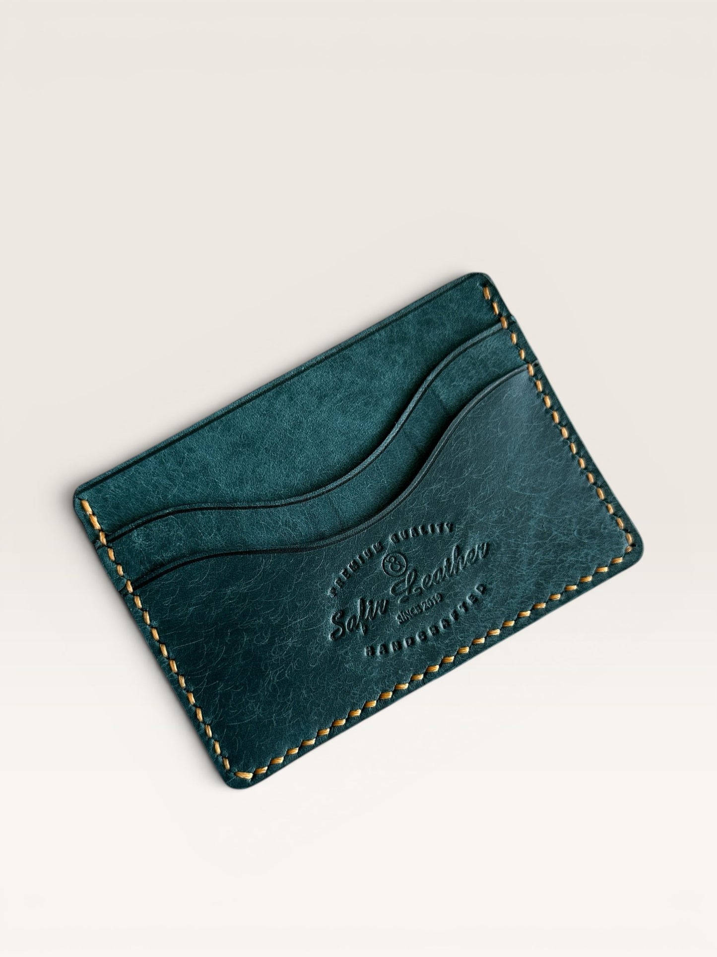 Safir Leather deep blue handmade genuine leather card holder with 5 card slots.