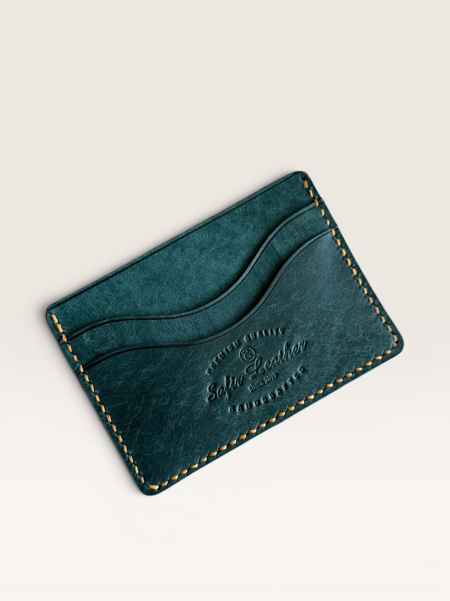 Safir Leather deep blue handmade genuine leather card holder with 5 card slots.
