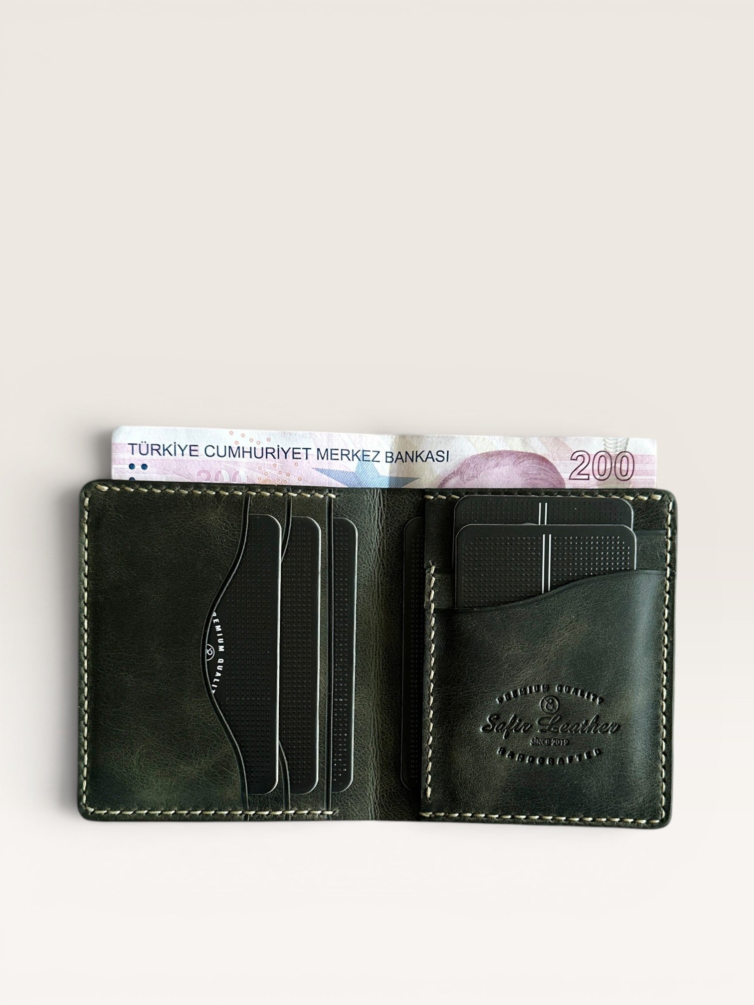 Safir Leather haki renkli, hakiki deri, el yapımı, kartlıklı cüzdan. 10x9 cm.