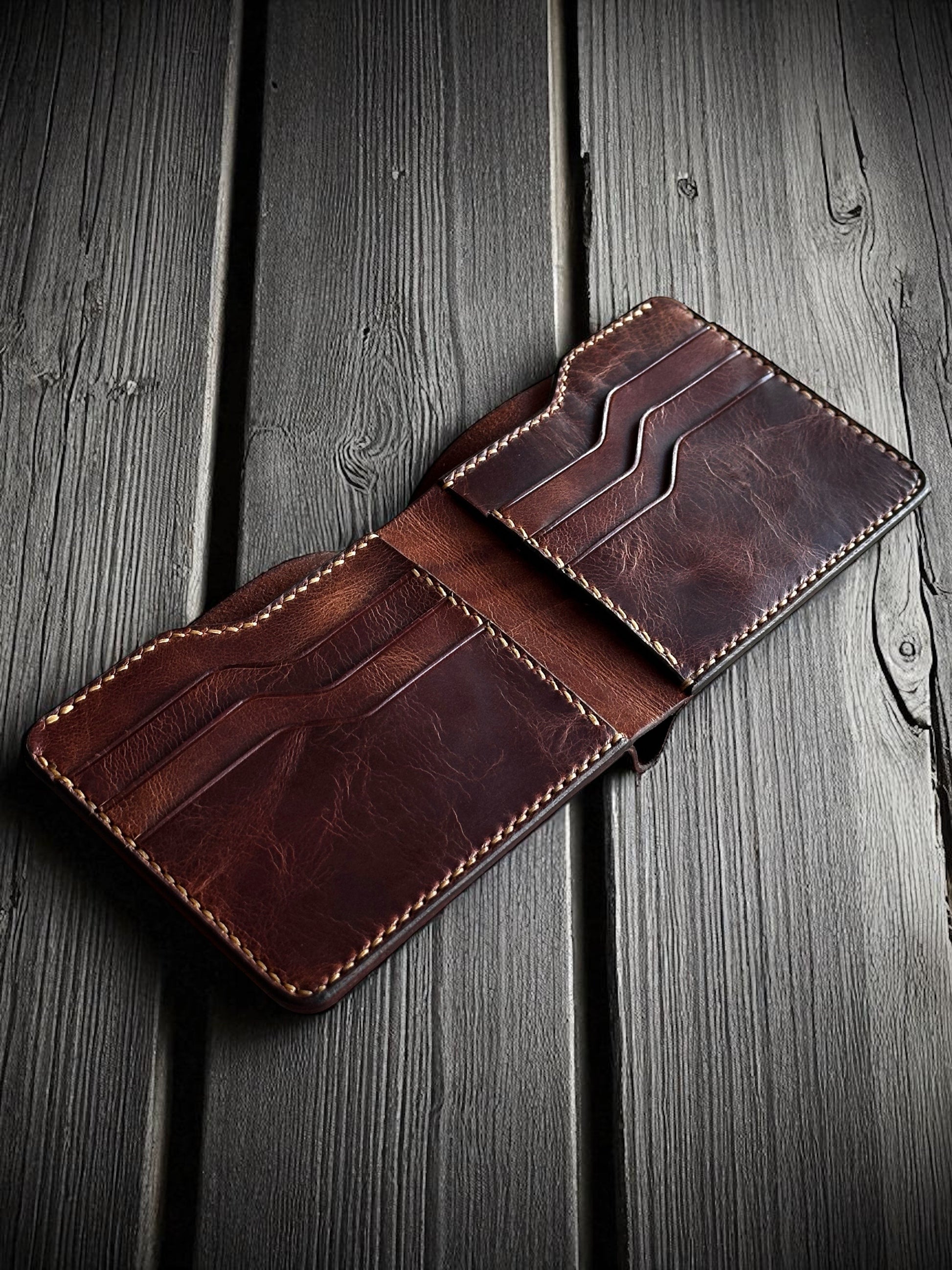 Safir Leather handmade dark brown Italian leather bifold wallet with multiple card slots and a vintage design.