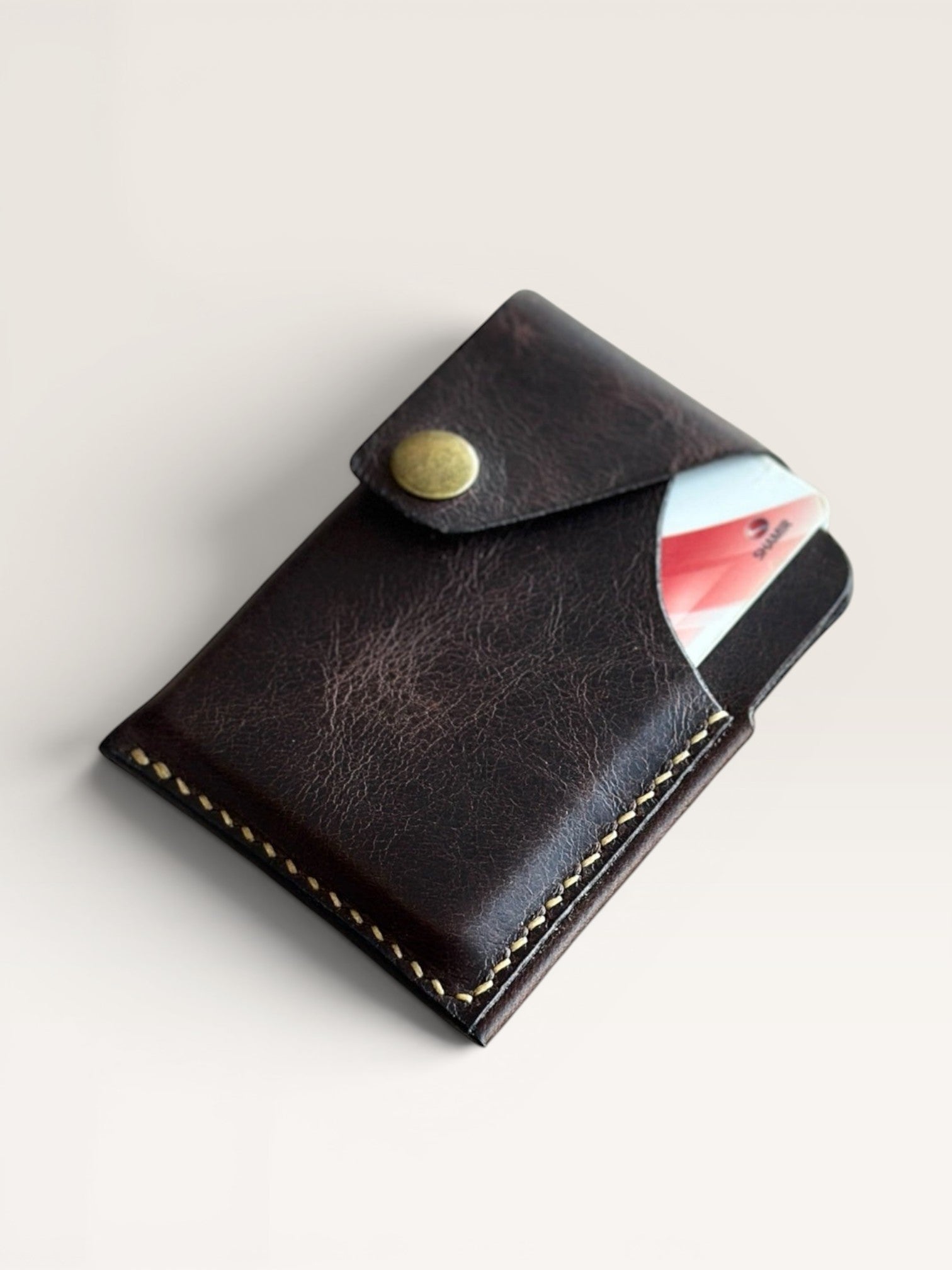 Safir Leather handmade dark brown genuine leather card holder, 8-10 card capacity, snap closure.