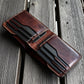 Safir Leather handmade dark brown Italian leather bifold wallet with multiple card slots.