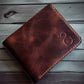 Safir Leather handmade dark brown genuine Italian leather bi-fold wallet with vintage design and embossed logo.