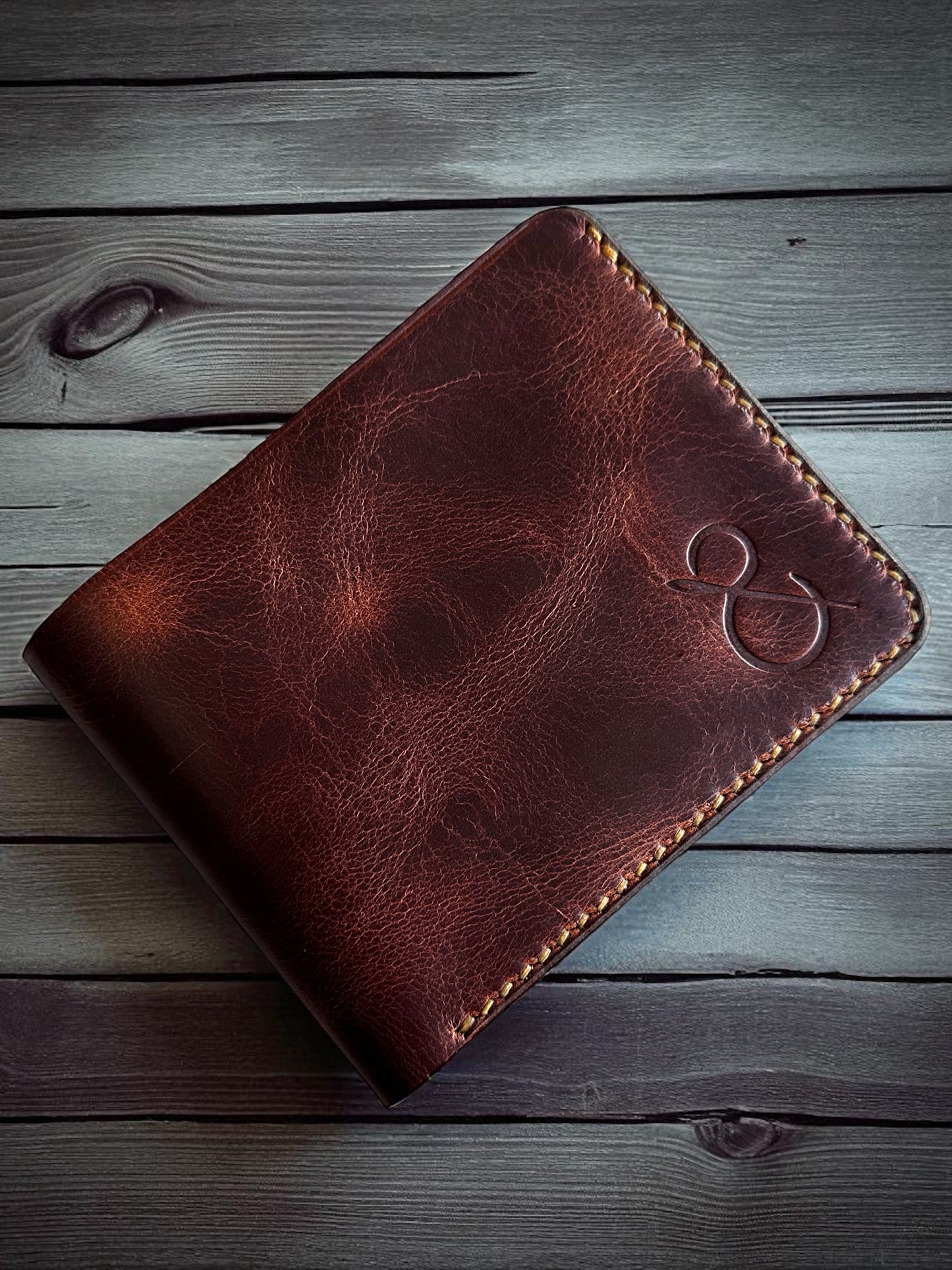 Safir Leather handmade dark brown genuine Italian leather bi-fold wallet with vintage design and embossed logo.