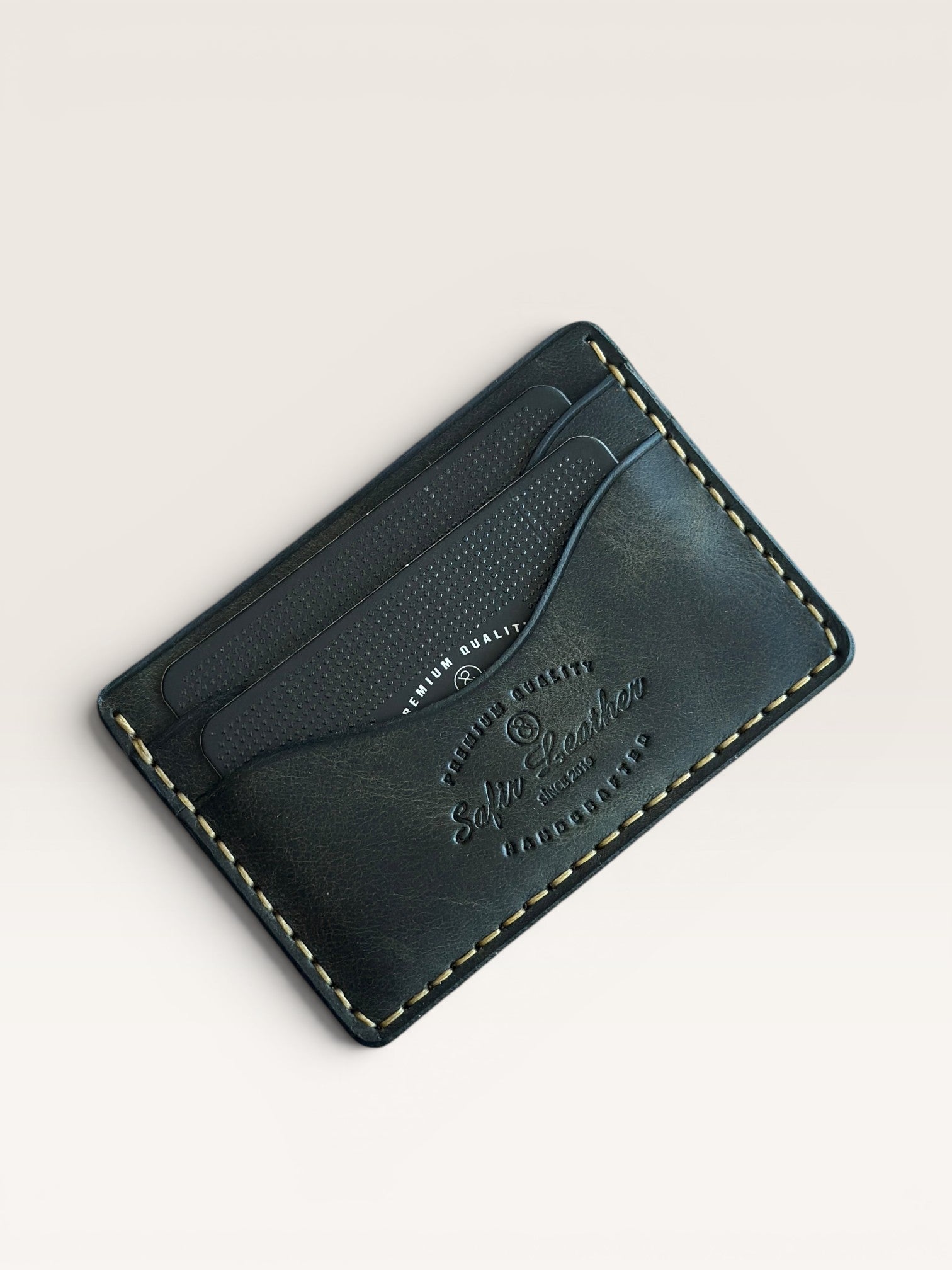 Safir Leather black handmade Italian leather cardholder with 5 compartments and organic stitching.
