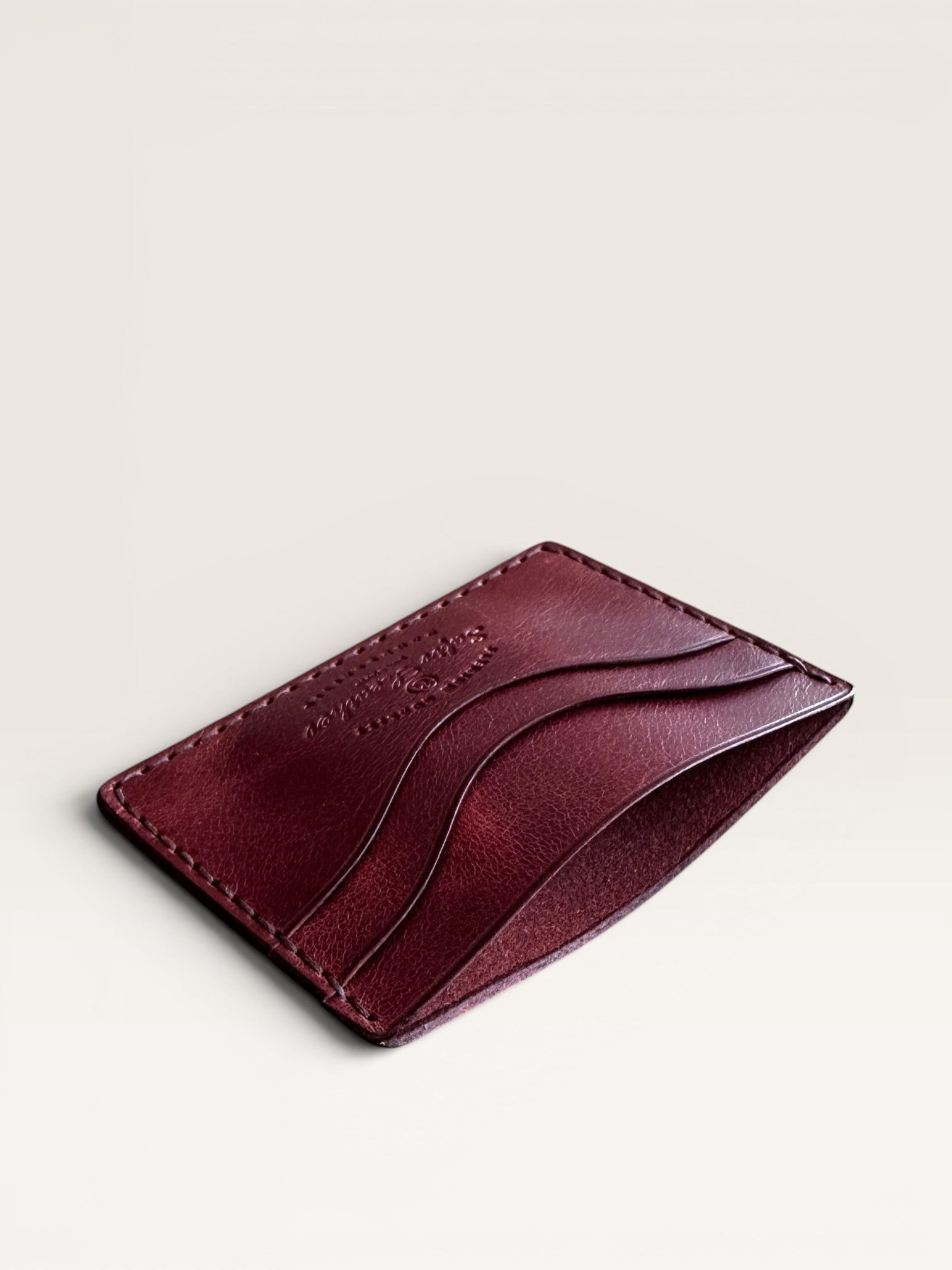 Safir Leather burgundy handmade Italian leather cardholder with 5 card slots and organic stitching.