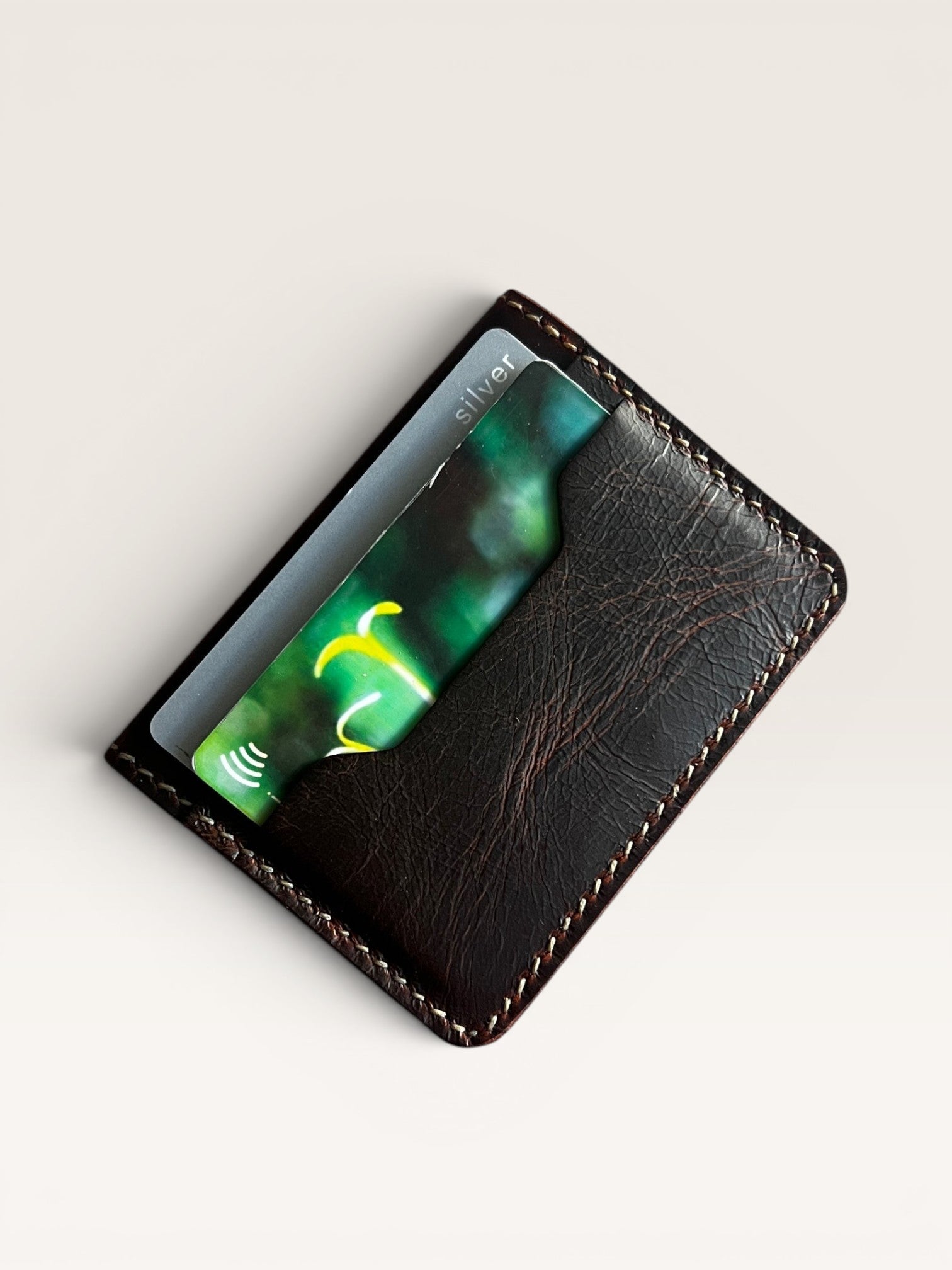 Safir Leather Italian dark brown distressed leather minimalist card holder wallet with white stitching, holds 6-12 cards.