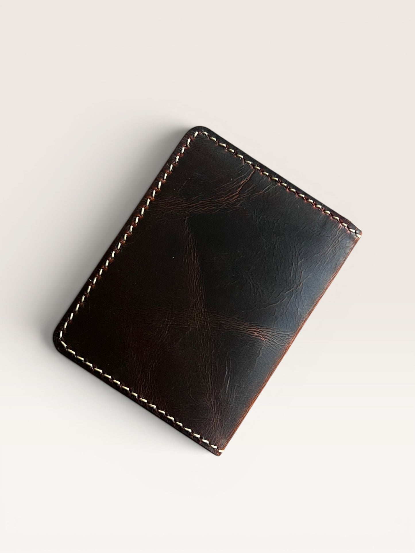 Safir Leather Italian dark brown genuine leather minimalist wallet with contrast stitching.