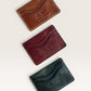 Safir Leather handmade Italian leather cardholder in brown, burgundy, and dark green with 5 card slots.