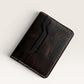 Safir Leather Italian dark brown distressed leather minimalist cardholder wallet with white stitching.