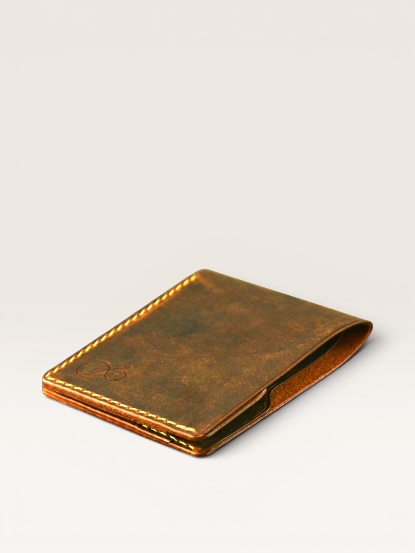 Safir Leather marka, kahverengi, hakiki deri, elde dikilmiş, minimal tasarımlı, unisex klasik cüzdan.
