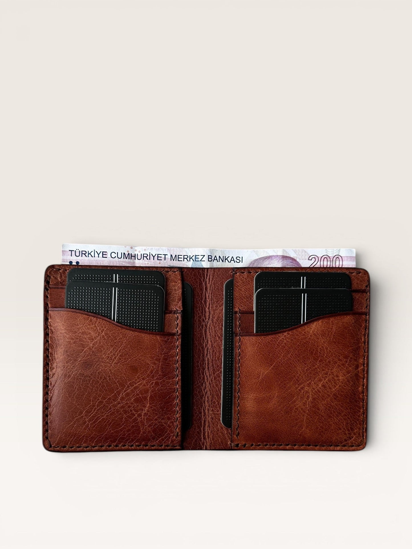 Safir Leather B-King kiremit deri cüzdan, kart ve para bölmeli.