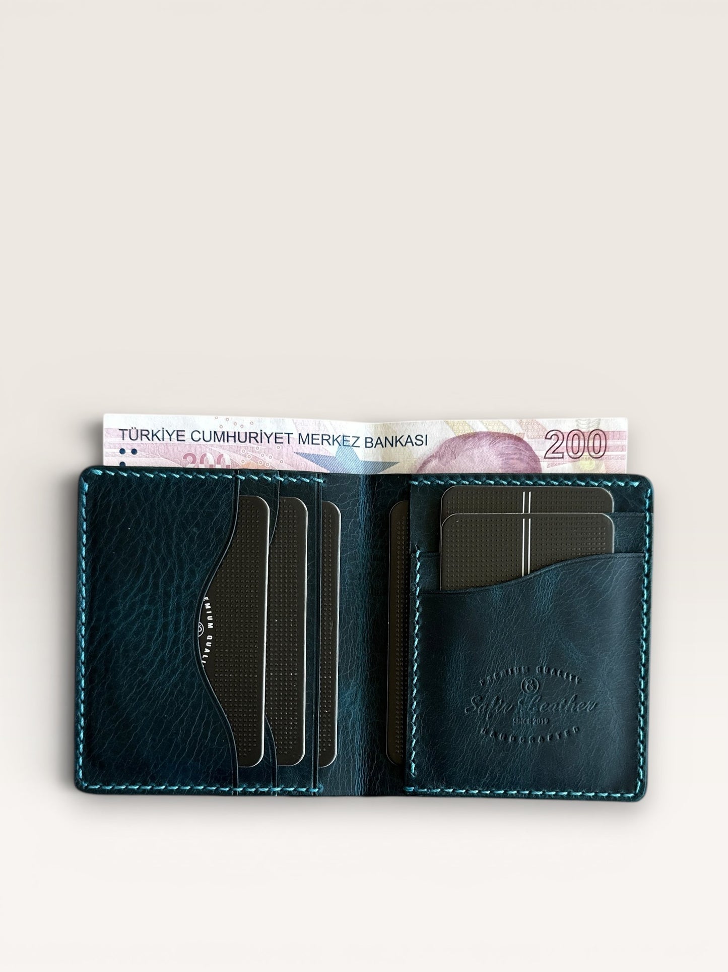 Safir Leather Babil model lacivert hakiki deri cüzdan, kart ve para bölmeli, el yapımı, 10x8.5 cm.