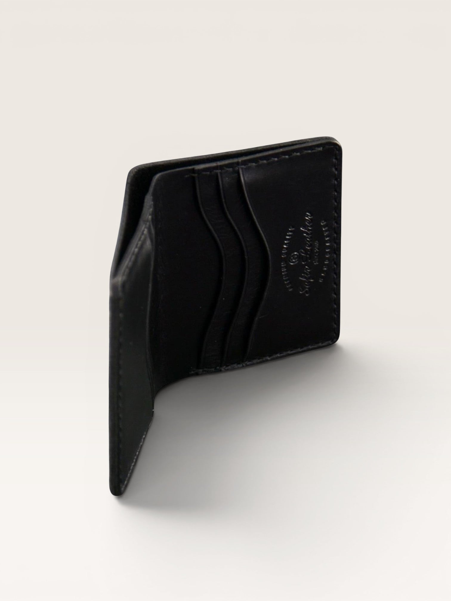 Safir Leather marka siyah hakiki deri, el yapımı, minimal tasarım, kartlık cüzdan.