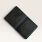 Safir Leather siyah hakiki deri, minimal tasarımlı, elde dikilmiş, 10x8.5 cm boyutlarında, 6-12 kart kapasiteli cüzdan.