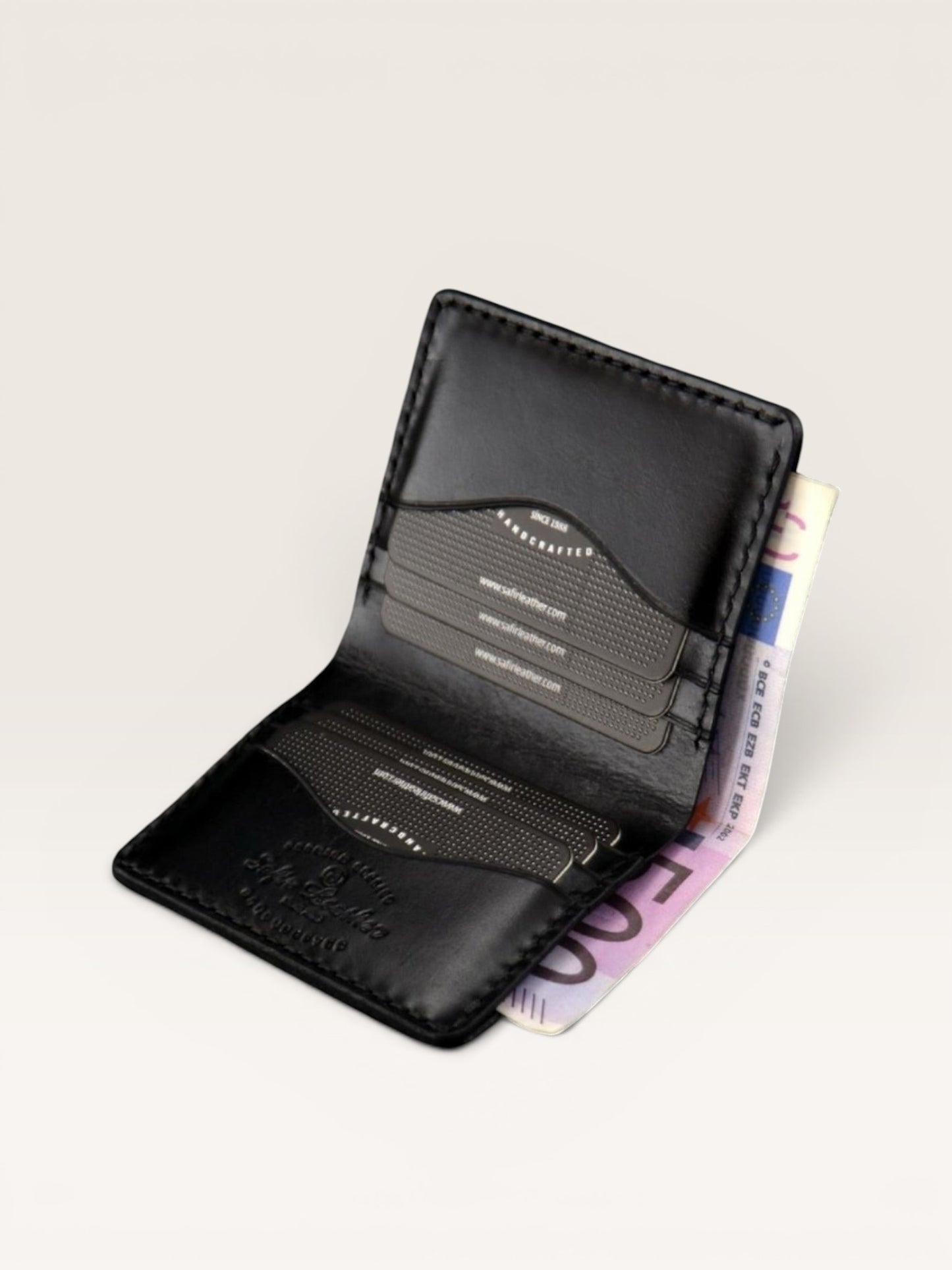 Safir Leather el yapımı siyah deri minimalist cüzdan, 8-12 kart kapasiteli, 10x8.5 cm boyutlarında.