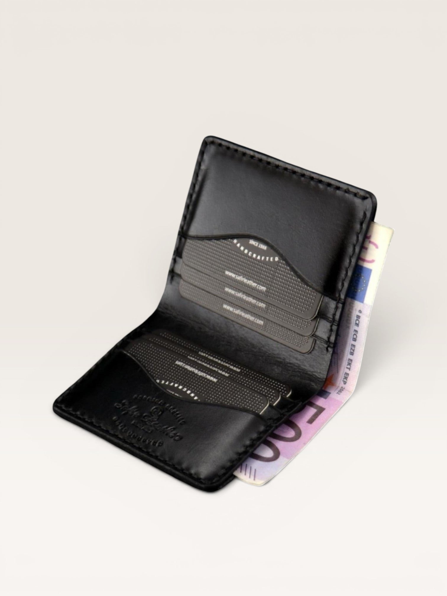 Safir Leather el yapımı siyah deri minimalist cüzdan, 8-12 kart kapasiteli, 10x8.5 cm boyutlarında.