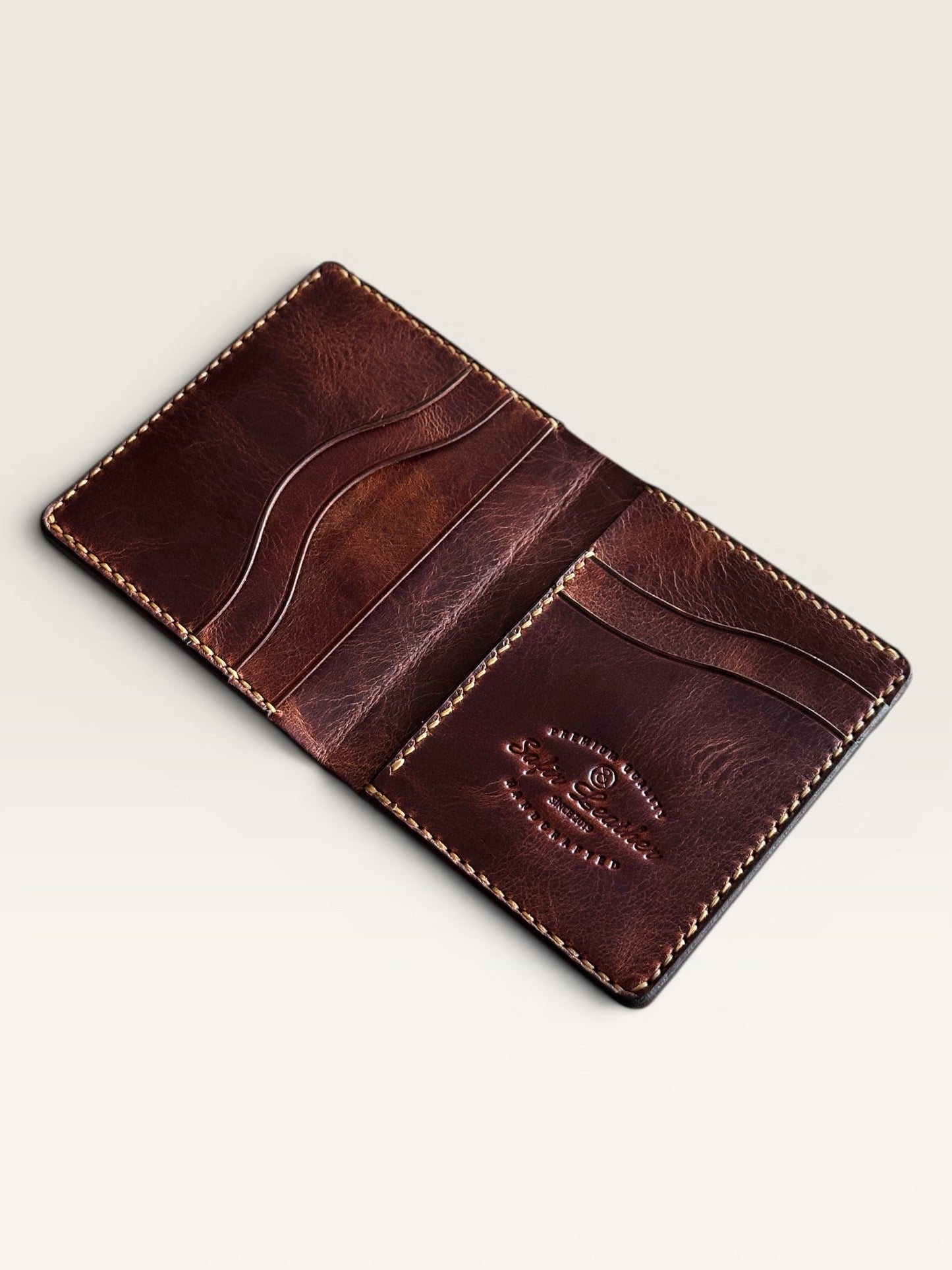 Safir Leather Babil model, taba renkli, hakiki deri, el yapımı, kartlık ve para bölmeli cüzdan.