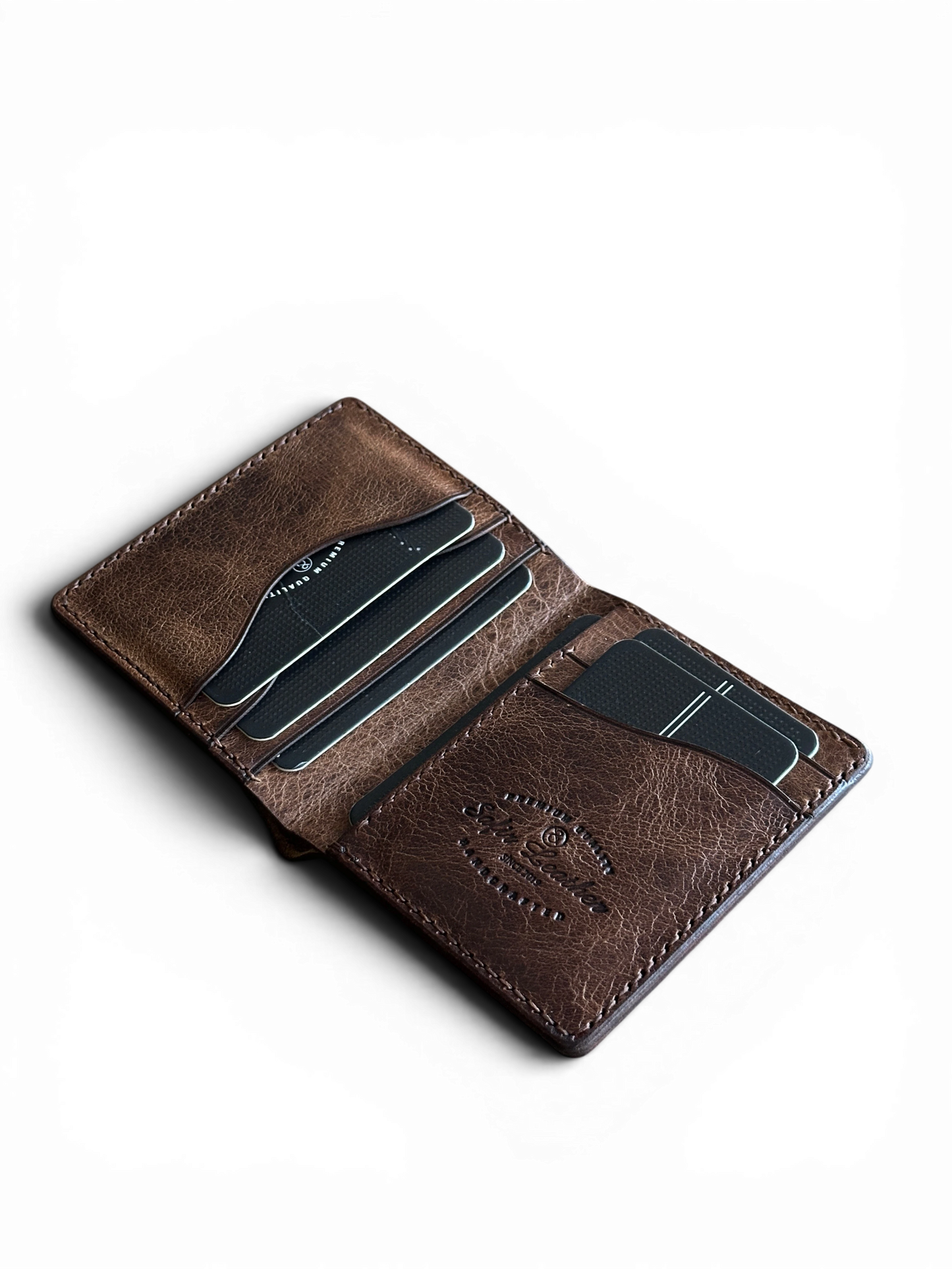 Safir Leather Babil Heritage taba rengi el yapımı İtalyan deri cüzdan, kart bölmeleri ve vintage dokusuyla.