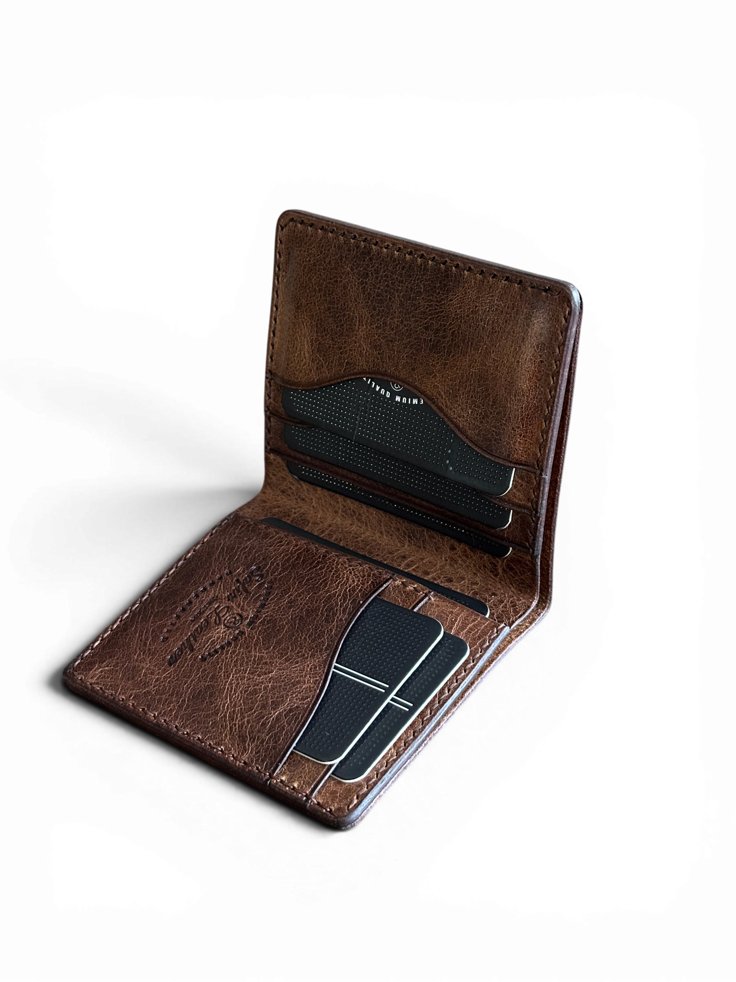 Safir Leather Babil Heritage taba rengi el yapımı İtalyan deri cüzdan, vintage dokulu ve kart bölmeli kompakt tasarım.