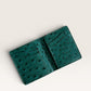 Safir Leather yeşil devekuşu derisi, el yapımı, minimalist cüzdan. 10x9 cm boyutlarında, 6-12 kart kapasiteli.